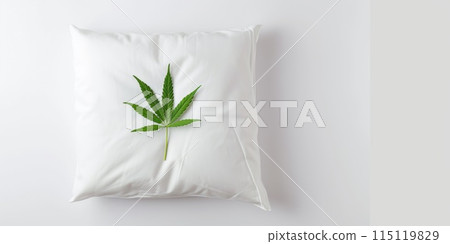 Minimalist Cannabis Leaf on White Pillow Background. Healthy Sleep with CBD Concept. Treating insomnia with medical marijuana 115119829