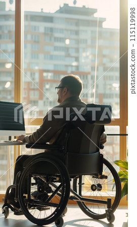 Vertical portrait of a person with a disability working as a programmer or web designer in a modern high-tech office, support and socialization of people with increased needs Vertical portrait of a person with a disability working as a programmer or web designer in a modern high-tech office, support and socialization of people with increased needs 115119998
