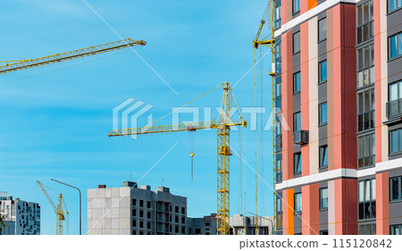 Construction site with crane. City house work under sky. New home estate architecture. Apartment Construction site with crane. City house work under sky. New home estate architecture. Apartment 115120842