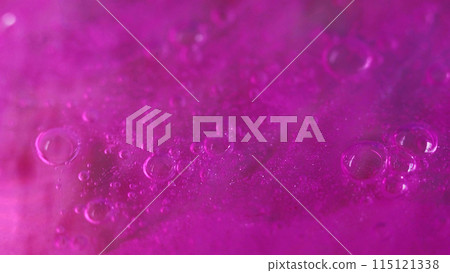 Bright paint. Water bubbles ink. Defocused pink purple color fluorescent glitter fluid shimmer foam emulsion motion abstract art background. 115121338