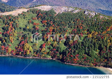 Lake Goshiki with autumn foliage as seen from Mount Issaikyo in the Azuma Mountain Range 115122735