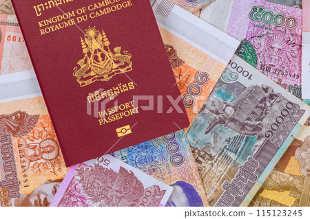 Cambodian passports over Cambodian banknotes in different Riels 115123245