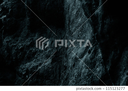 Bluish, rough and rugged rock surface (wall) 115123277
