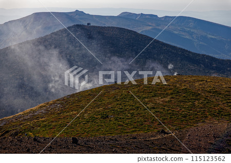 View of Mt. Adatara and smoke from Mt. Issaikyo in the Azuma Mountain Range 115123562