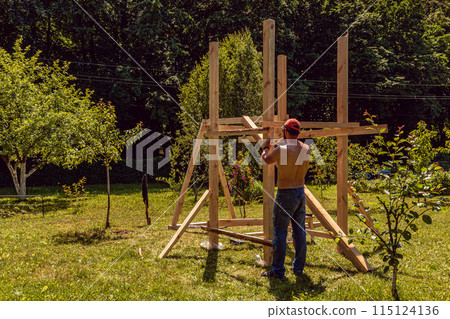 Construction of a children's house in the garden of a country house Construction of a children's house in the garden of a country house 115124136