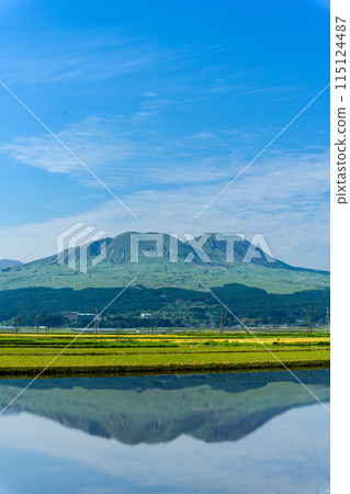 Reflection of Mt. Aso (the Five Peaks of Aso) before rice planting on a beautiful spring day (Uchimaki, Aso City) Reflection of Mt. Aso (the Five Peaks of Aso) before rice planting on a beautiful spring day (Uchimaki, Aso City) 115124487
