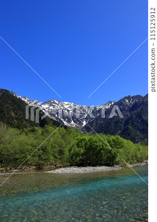 Fresh greenery in Kamikochi: Hotaka mountain range and Azusa River Fresh greenery in Kamikochi: Hotaka mountain range and Azusa River 115125912