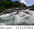 Rafting boats crossing big waves 115125965