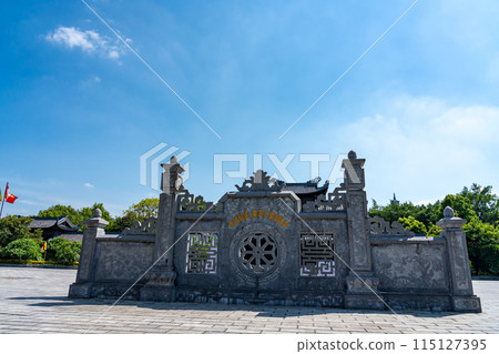The entrance wall of Bai Dinh Pagoda, a World Heritage Site in Ninh Binh, Hanoi, Vietnam, boasting the largest site area in the Orient. 115127395