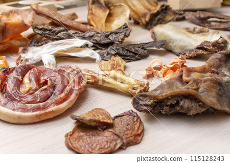 Natural treats for pets. dried meat products to feed and motivate dogs Natural treats for pets. dried meat products to feed and motivate dogs 115128243