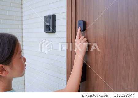 Child unlocking front door with fingerprint Child unlocking front door with fingerprint 115128544
