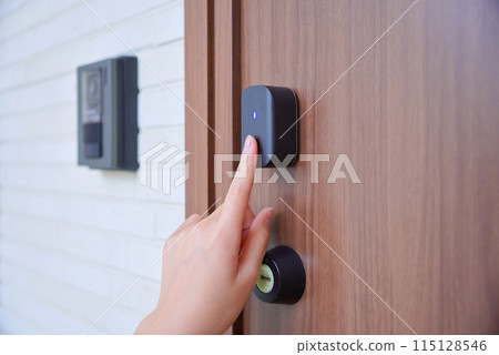 Child unlocking front door with fingerprint 115128546
