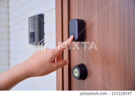 Child unlocking front door with fingerprint Child unlocking front door with fingerprint 115128547