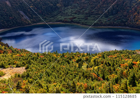 Lake Goshiki with autumn foliage as seen from Mount Igatama in the Azuma Mountain Range Lake Goshiki with autumn foliage as seen from Mount Igatama in the Azuma Mountain Range 115128685