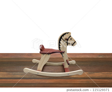 Rocking horse on wooden floor Isolated on a white background Rocking horse on wooden floor Isolated on a white background 115129371