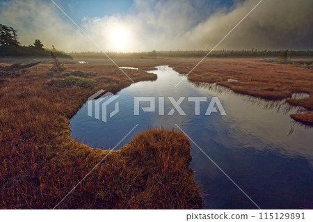 The morning sun shines on the Azuma Mountain Range, the marshlands of Yabeidaira, and Lake Myojo 115129891