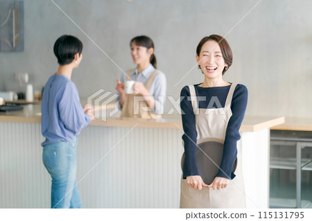 People working in a cafe People working in a cafe 115131795