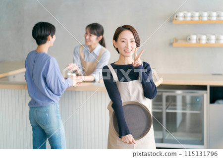 People working in a cafe 115131796