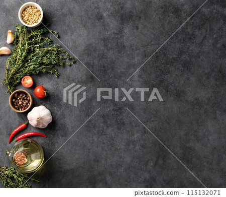 Seasonings, spices and fresh herbs thyme, coriander, garlic, pepper,  tomatoes chili pepper  115132071