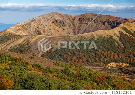 Mt. Azuma-Kofuji in autumn colors seen from the hiking trail from Sugahira in the Azuma Mountain Range 115132361