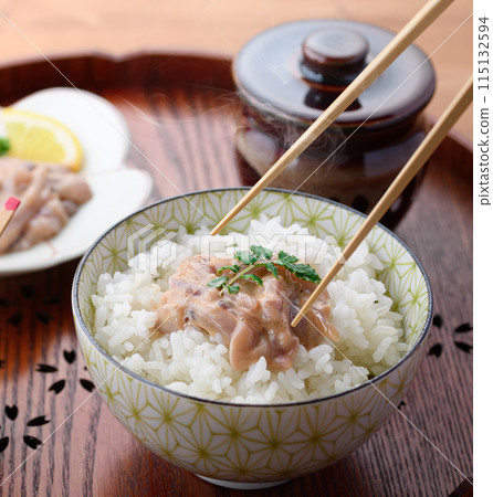 Shiokara squid served on hot rice Shiokara squid served on hot rice 115132594
