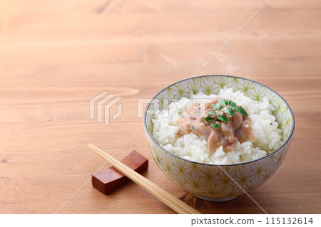Shiokara squid served on hot rice 115132614