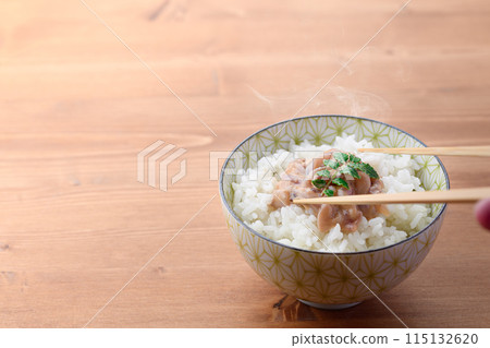 Shiokara squid served on hot rice 115132620