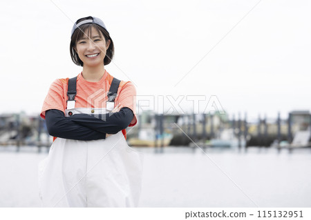 Young woman working at the fishing port Young woman working at the fishing port 115132951