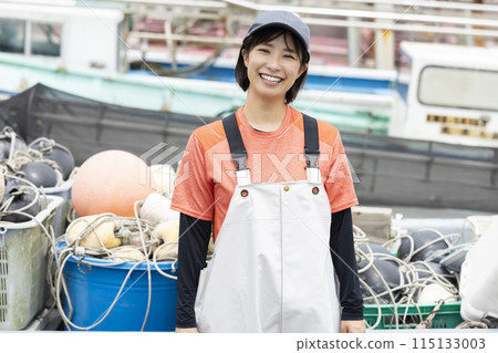Woman working at fishing port Woman working at fishing port 115133003