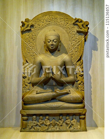 A beautiful First Turning of the Wheel Buddha at the State Museum in Sarnath, the holy land in India where Buddha gave his first sermon 115136857