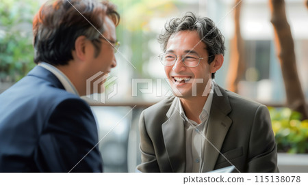 Two businessmen making a meeting Two businessmen making a meeting 115138078