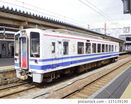 Hokuetsu Express local train HK100 series train at Naoetsu Station 115139190