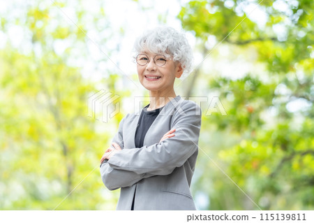 Senior woman business fresh greenery Senior woman business fresh greenery 115139811