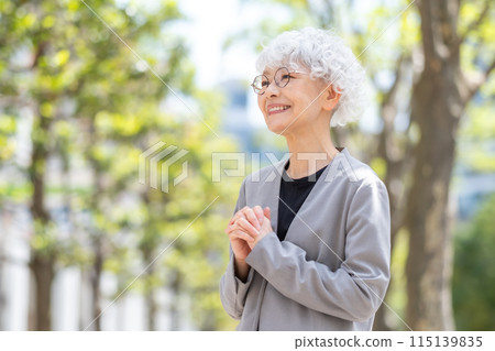 Senior woman business fresh greenery Senior woman business fresh greenery 115139835
