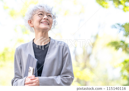 Senior woman business tablet 115140116