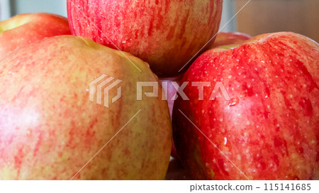 Culinary Apple Use. Red apples, can be used in cooking or recipe imagery. 115141685