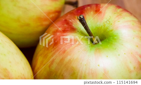 Juicy Apples Variety. A selection of ripe apples, emphasizing their juiciness, ideal for grocery ads. Juicy Apples Variety. A selection of ripe apples, emphasizing their juiciness, ideal for grocery ads. 115141694