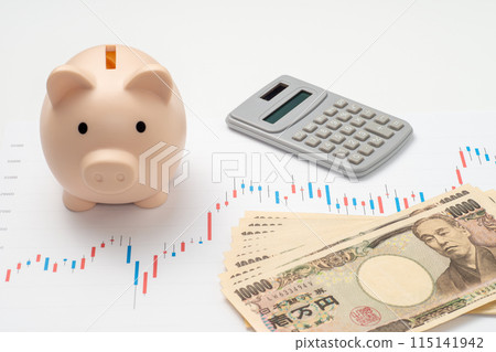 Cash and stock chart and piggy bank and calculator Cash and stock chart and piggy bank and calculator 115141942