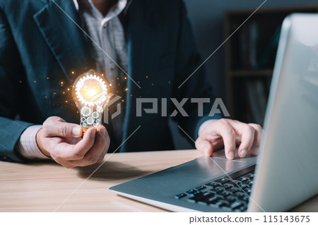 person hand holding power lightbulb and pretend to think, inspiration, creativity and imagination concept, innovation technology success business. person hand holding power lightbulb and pretend to think, inspiration, creativity and imagination concept, innovation technology success business. 115143675