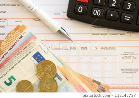 Filling italian tax form process with pen, calculator and euro money bills close up. Tax paying period and deadline 115143757