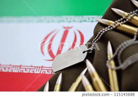 Many rifle bullets and dog tags with flag of Islamic Republic of Iran. The concept assault and terrorism in Iran 115143886