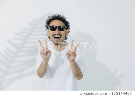 Man wearing sunglasses Man wearing sunglasses 115144495