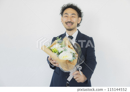 Businessman with a bouquet Businessman with a bouquet 115144552