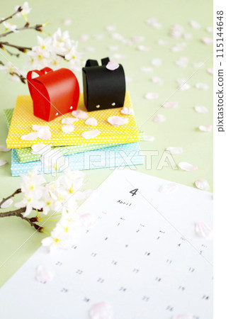 Cherry blossom petals and red school bag April calendar Image of school entrance and new semester Cherry blossom petals and red school bag April calendar Image of school entrance and new semester 115144648