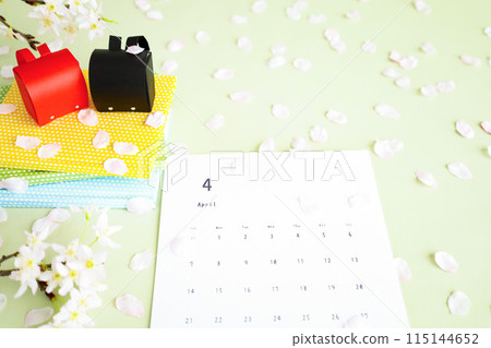 Cherry blossom petals and red school bag April calendar Image of school entrance and new semester Cherry blossom petals and red school bag April calendar Image of school entrance and new semester 115144652