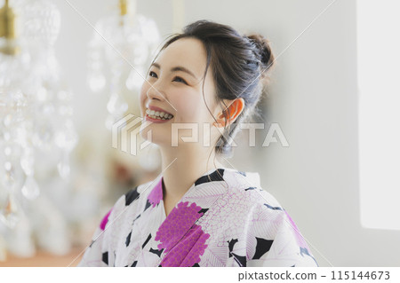 A woman in a yukata A woman in a yukata 115144673