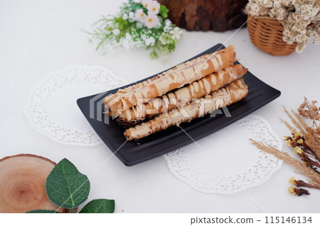 Tiramisu flavored banana rolls as a background 115146134