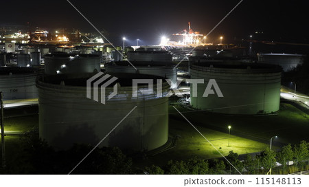 A night view from the observation deck of Ohata Kaizuka Park in Iwaki, Fukushima Prefecture, showing the tanks and the industrial area around Onahama Port. 115148113