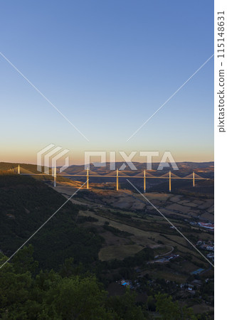 Multi-span cable stayed Millau Viaduct across gorge valley of Tarn River, Aveyron Departement, France Multi-span cable stayed Millau Viaduct across gorge valley of Tarn River, Aveyron Departement, France 115148631