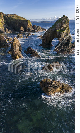 Aerial view of the Crohy Head Sea Arch, County Donegal - Ireland. 115148975